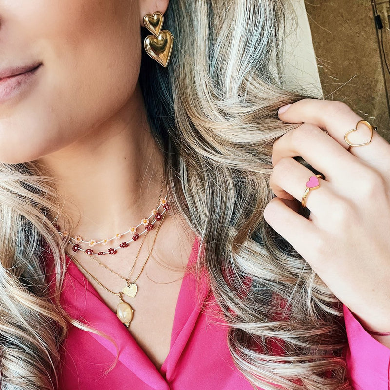 Ketting met madeliefjesbloem – roest/zalm