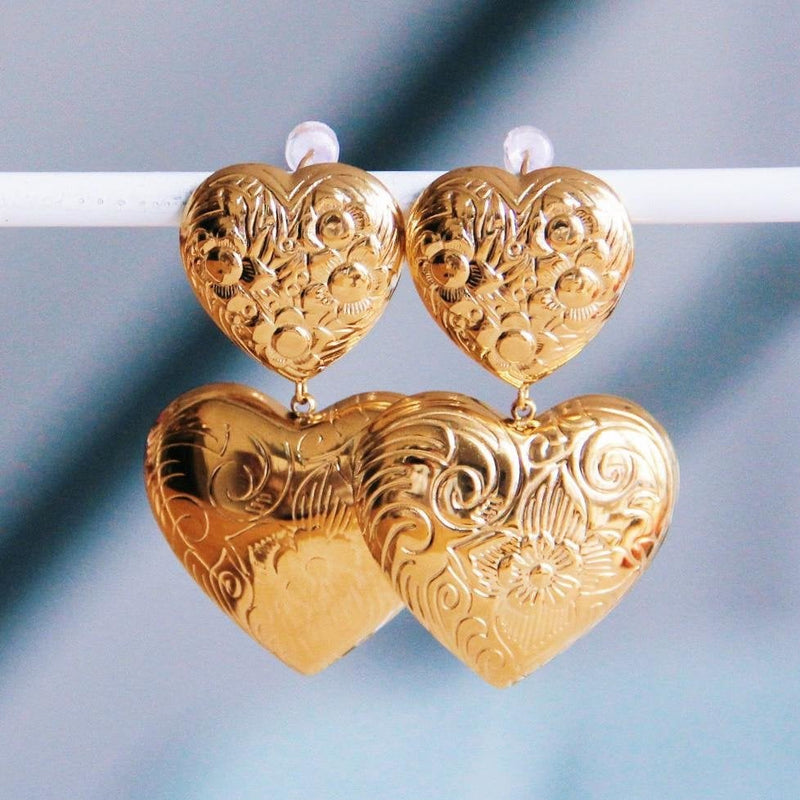 Statement oorbellen met bewerkte hartjes
