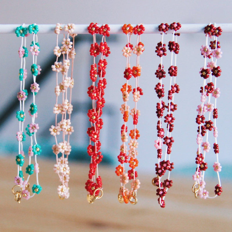 Ketting met madeliefjesbloem – zalmroze/oranje