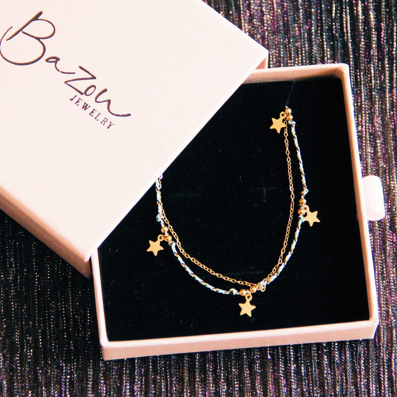 Minimalistische dubbele ketting met koord en sterren
