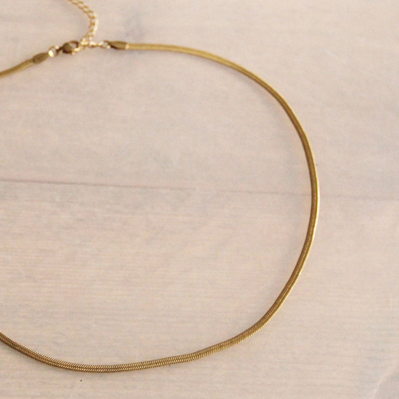Platte “Snake” ketting 3mm - goudkleur