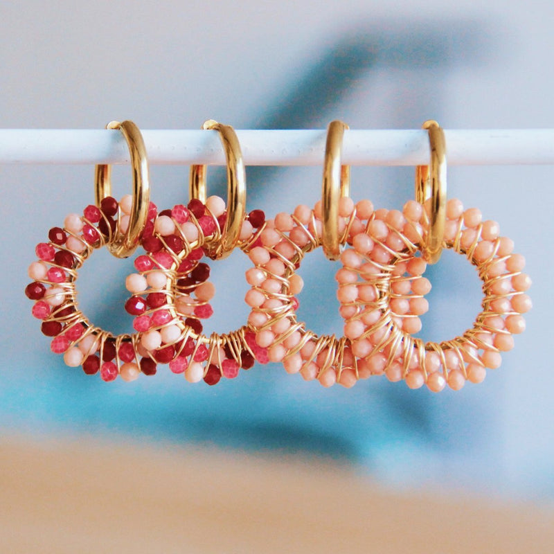 Oorrel met ronde facet hanger - zalm