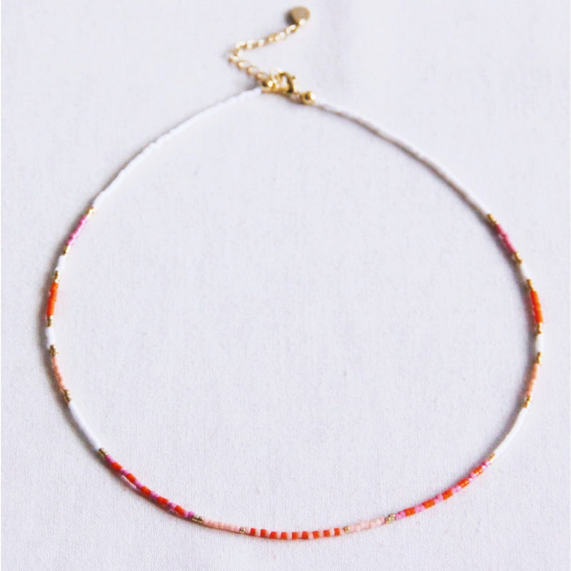 Kralen ketting wit/paars/oranje/naakt