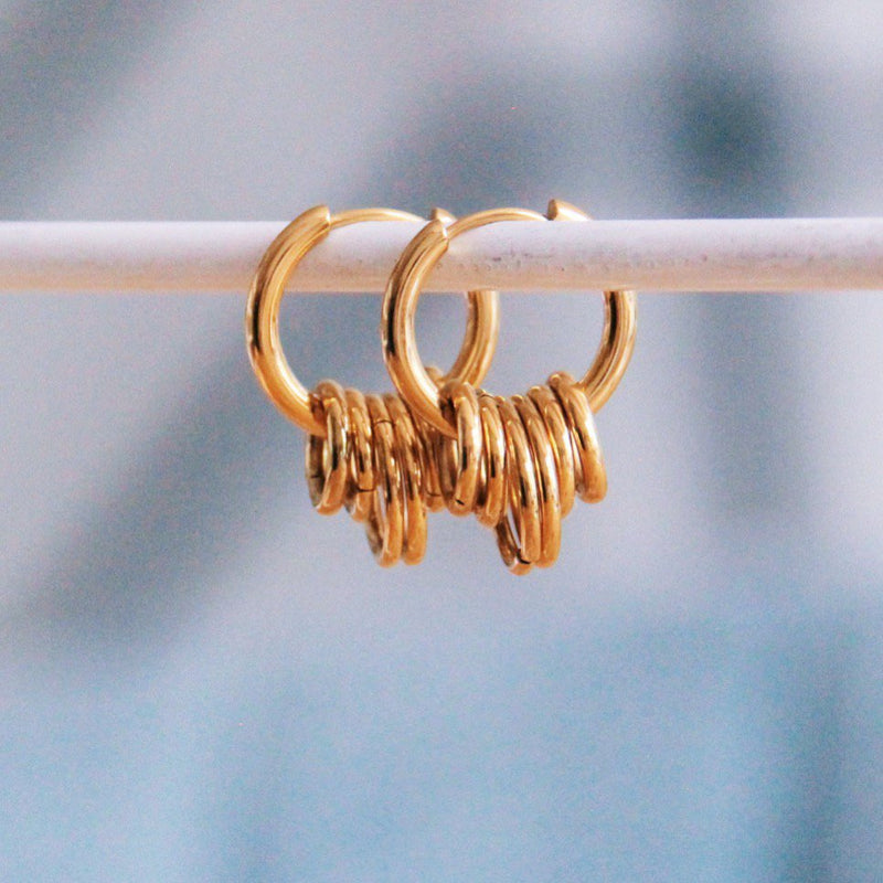 RVS oorbel met ringen - goud