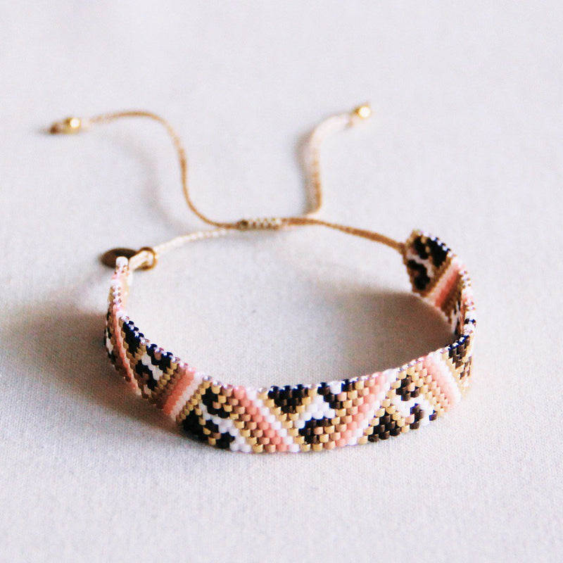Gestreepte geweven armband met luipaardprint - zalm/taupe